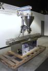 Used Mateer-Burt 3900 Series Automatic Auger Filler, Model 3919. Capable of speeds up to 90 containers per minute, depending on product. Has pin indexing system, bottom up fill and a stainless steel ...