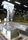 Used Mateer-Burt 3900 Series Automatic Auger Filler, Model 3919. Capable of speeds up to 90 containers per minute, depending on product. Has pin indexing system, bottom up fill and a stainless steel ...