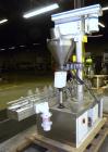 Used Mateer-Burt 3900 Series Automatic Auger Filler, Model 3919. Capable of speeds up to 90 containers per minute, depending on product. Has pin indexing system, bottom up fill and a stainless steel ...