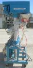 Used Image 4000 Quad Four Head Inline Auger Filling System. Each fillerhas a 22