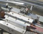 Used Image 4000 Quad Four Head Inline Auger Filling System. Each fillerhas a 22