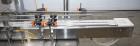 Used- Per Fil Industries PF23  Single Head Auger Filler with Conveyor. Right to Left Configuration. Speeds of 10 - 40 CPM De...