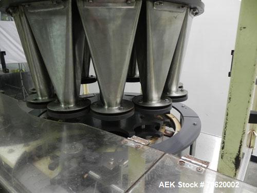 Used All-Fill Model R-212 Rotary Auger Filler. Machine has 12 pockets with dual head auger filler. Has worm screw to starwheel infeed to star discharge. Turret has a 30" pitch for a mximum container ...