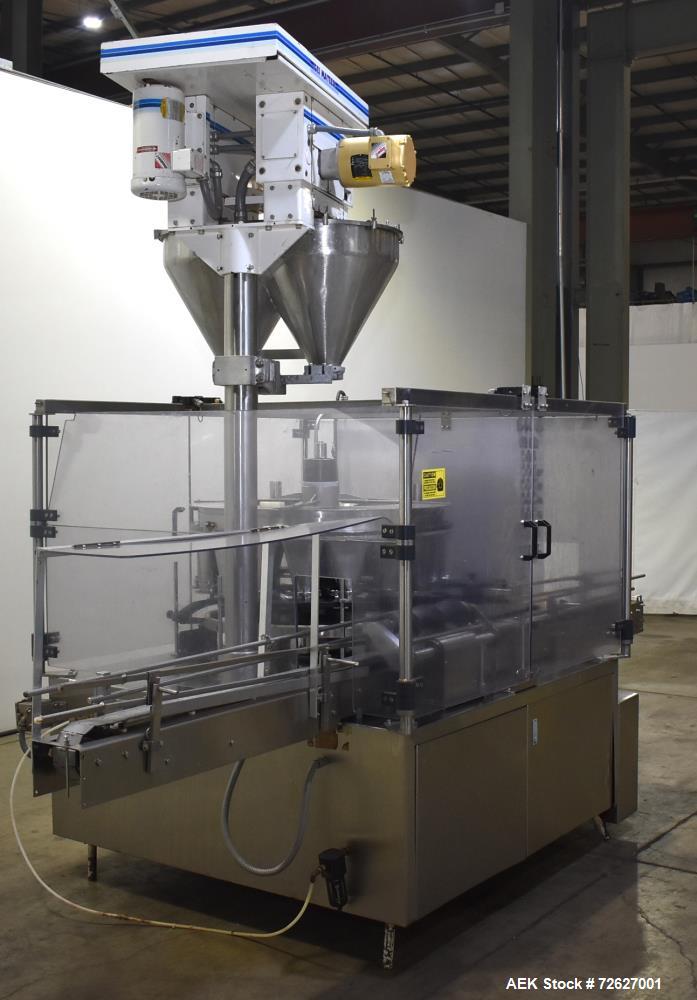 Used Mateer Pneumatic Scale Model 6700 18-Station Rotary Auger Filler.