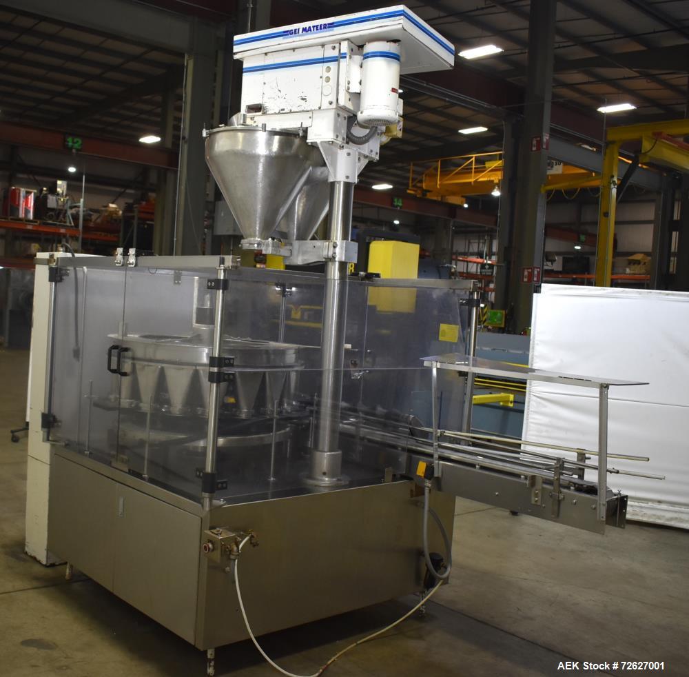 Used Mateer Pneumatic Scale Model 6700 18-Station Rotary Auger Filler.
