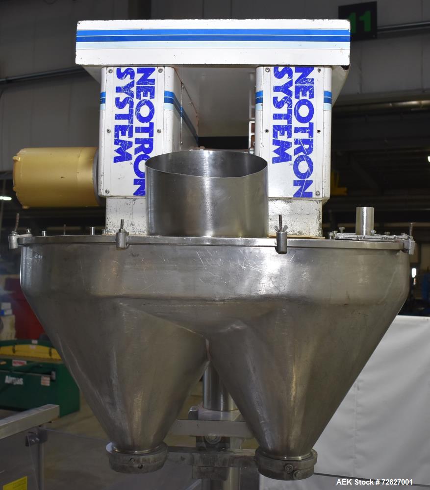 Used Mateer Pneumatic Scale Model 6700 18-Station Rotary Auger Filler.