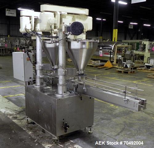 Used Mateer Dual Head Powder Auger Filler. Dual chain conveyor, 3/8" wide x 120" long. Has agitated hoppers. Has spinner plate tooling with dust collection. pneaumatic container indexing & bottom up ...