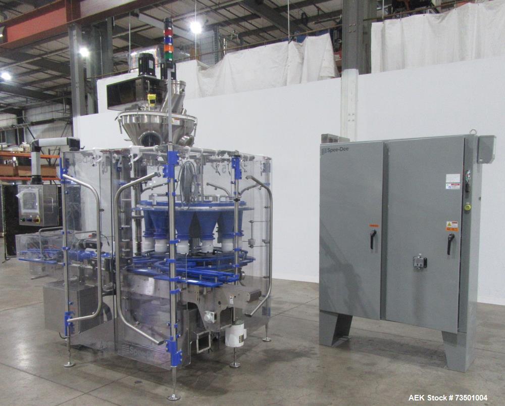 Unused Speed Dee Model 3700S Servo Rotary Auger Filler with Integrated Wipotec (OCS) Checkweigher. Has Twin Auger filler with 36" Diameter base unit. Dyco bottle throttle for transitioning bottles of...