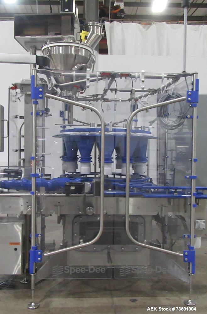 Unused Speed Dee Model 3700S Servo Rotary Auger Filler with Integrated Wipotec (OCS) Checkweigher. Has Twin Auger filler with 36" Diameter base unit. Dyco bottle throttle for transitioning bottles of...