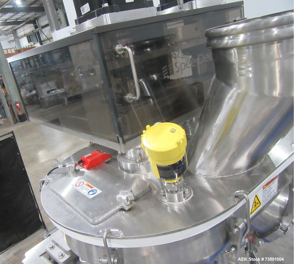 Unused Speed Dee Model 3700S Servo Rotary Auger Filler with Integrated Wipotec (OCS) Checkweigher. Has Twin Auger filler with 36" Diameter base unit. Dyco bottle throttle for transitioning bottles of...