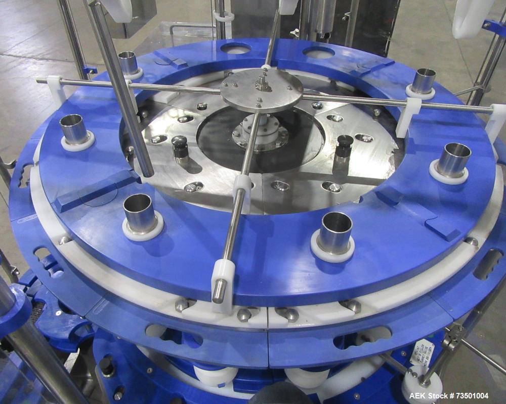 Unused Speed Dee Model 3700S Servo Rotary Auger Filler with Integrated Wipotec (OCS) Checkweigher. Has Twin Auger filler with 36" Diameter base unit. Dyco bottle throttle for transitioning bottles of...
