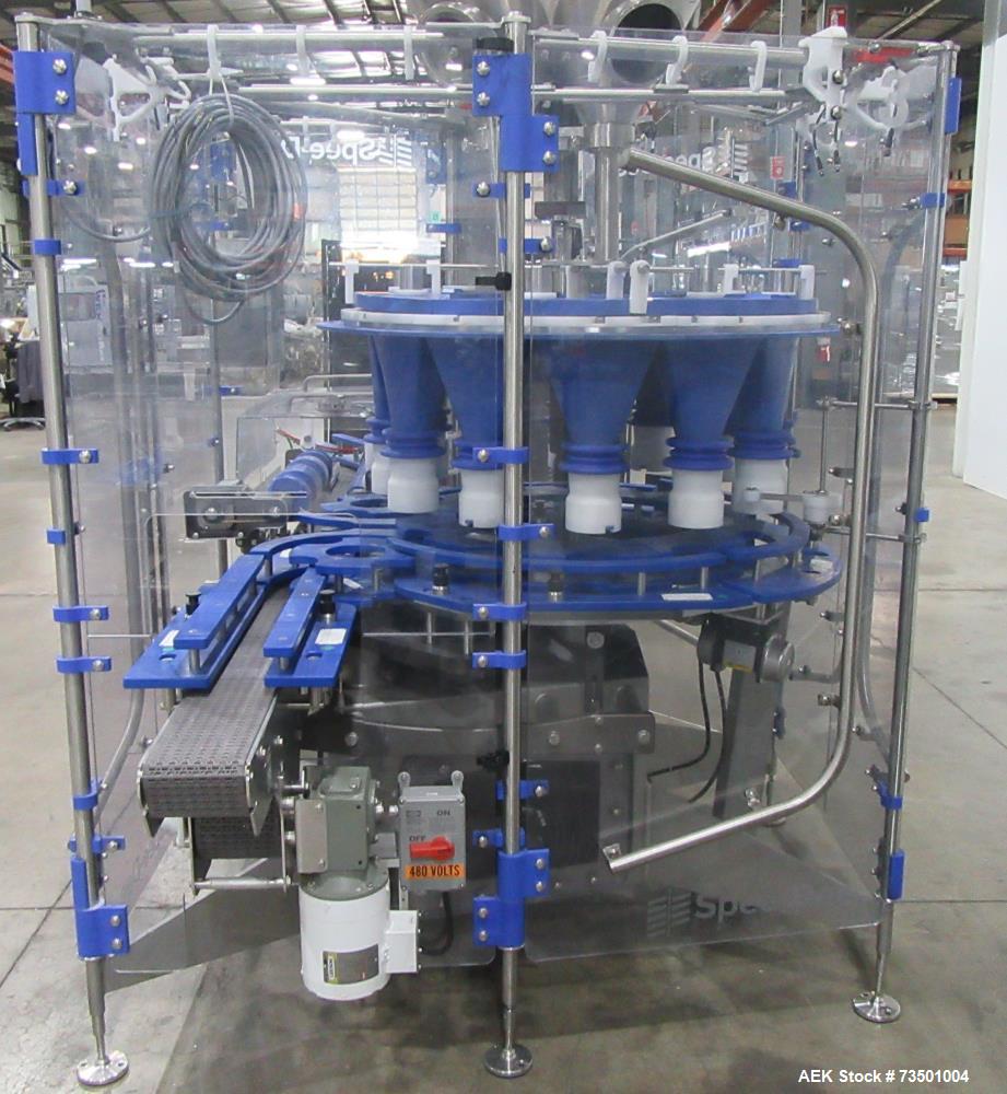 Unused Speed Dee Model 3700S Servo Rotary Auger Filler with Integrated Wipotec (OCS) Checkweigher. Has Twin Auger filler with 36" Diameter base unit. Dyco bottle throttle for transitioning bottles of...