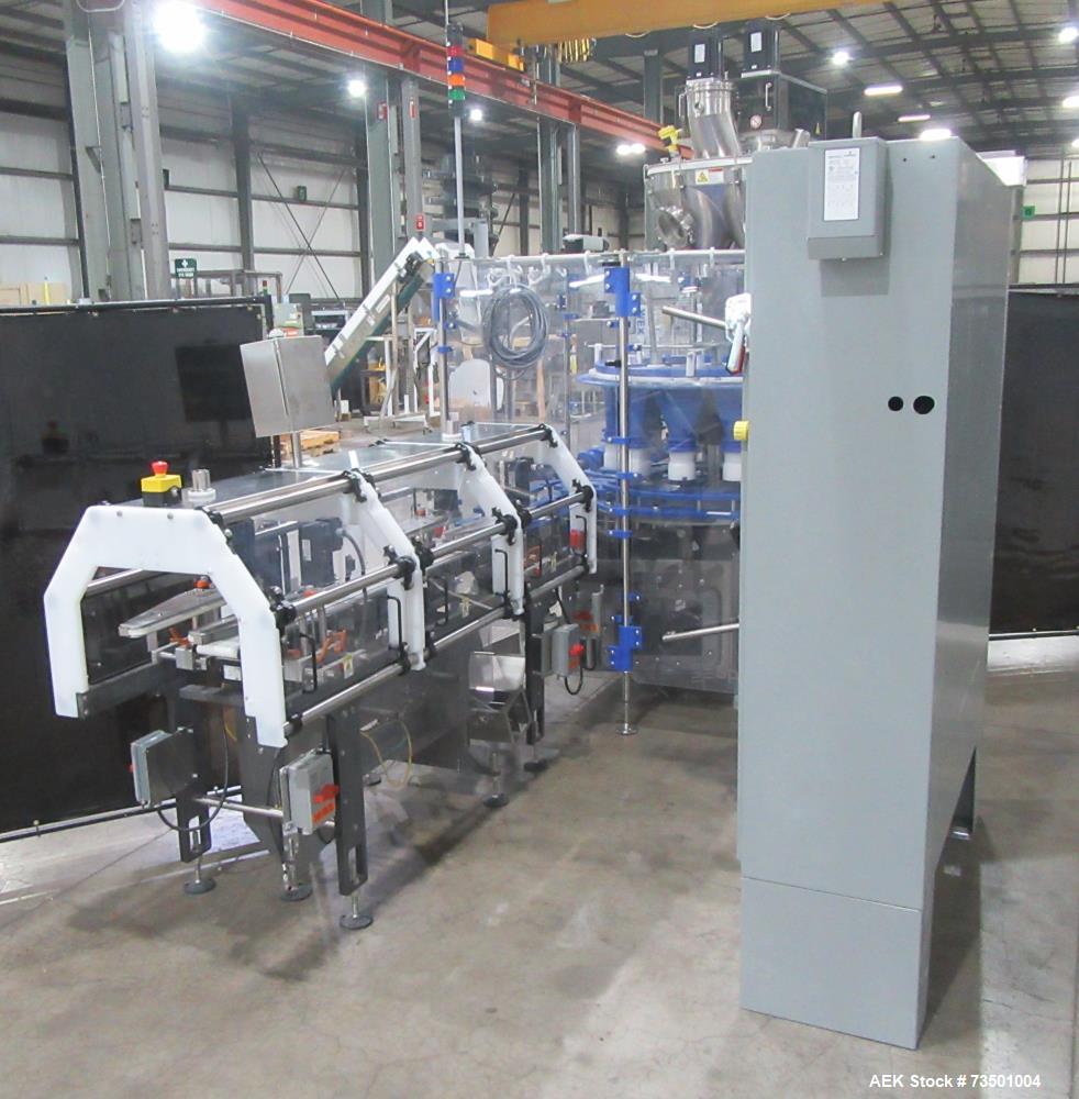 Unused Speed Dee Model 3700S Servo Rotary Auger Filler with Integrated Wipotec (OCS) Checkweigher. Has Twin Auger filler with 36" Diameter base unit. Dyco bottle throttle for transitioning bottles of...