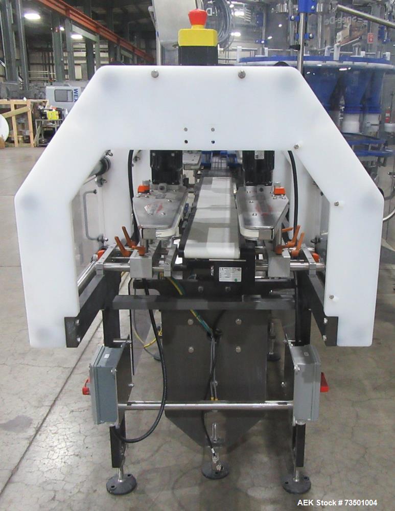 Unused Speed Dee Model 3700S Servo Rotary Auger Filler with Integrated Wipotec (OCS) Checkweigher. Has Twin Auger filler with 36" Diameter base unit. Dyco bottle throttle for transitioning bottles of...