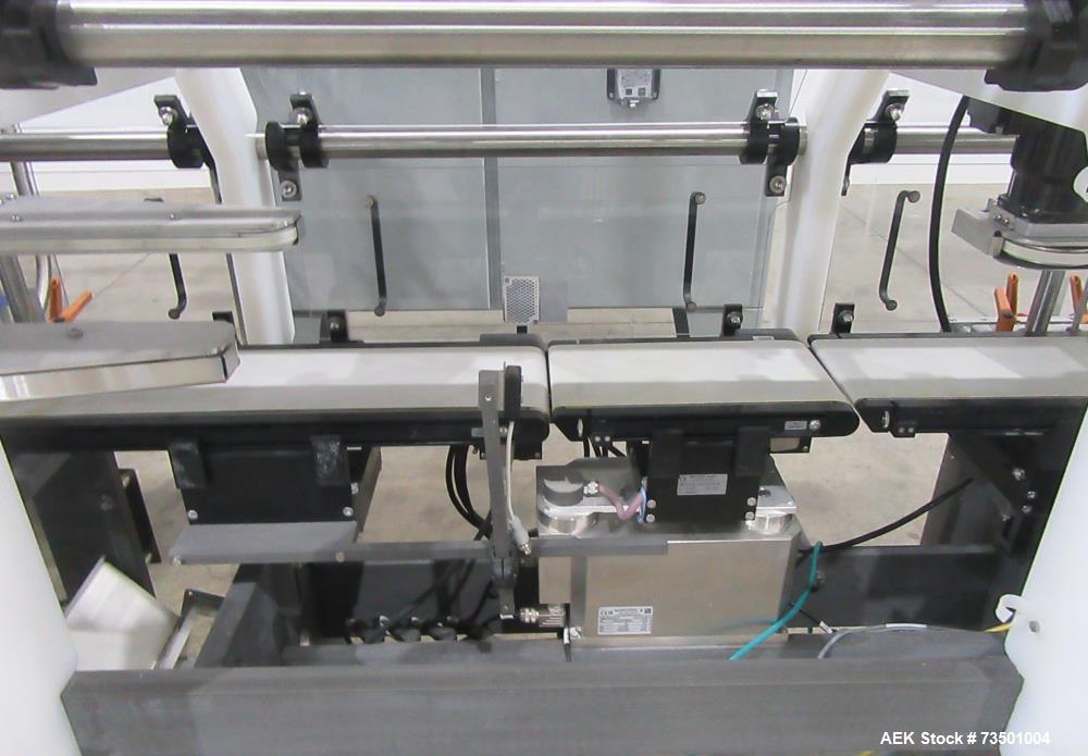 Unused Speed Dee Model 3700S Servo Rotary Auger Filler with Integrated Wipotec (OCS) Checkweigher. Has Twin Auger filler with 36" Diameter base unit. Dyco bottle throttle for transitioning bottles of...