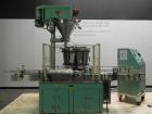 Used All-Fill Model R-212 Rotary Auger Filler. Machine has 12 pockets with dual head auger filler. Has worm screw to starwheel infeed to star discharge. Turret has a 30