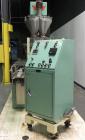 Used All-Fill Model R-212 Rotary Auger Filler. Machine has 12 pockets with dual head auger filler. Has worm screw to starwheel infeed to star discharge. Turret has a 30