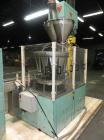 Used All-Fill Model R-212 Rotary Auger Filler. Machine has 12 pockets with dual head auger filler. Has worm screw to starwheel infeed to star discharge. Turret has a 30