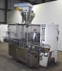 Used Mateer Pneumatic Scale Model 6700 18-Station Rotary Auger Filler.