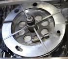 Used Mateer Pneumatic Scale Model 6700 18-Station Rotary Auger Filler.