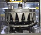 Used Mateer Pneumatic Scale Model 6700 18-Station Rotary Auger Filler.