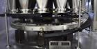 Used Mateer Pneumatic Scale Model 6700 18-Station Rotary Auger Filler.