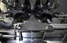 Used Mateer Pneumatic Scale Model 6700 18-Station Rotary Auger Filler.