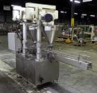 Used Mateer Dual Head Powder Auger Filler. Dual chain conveyor, 3/8