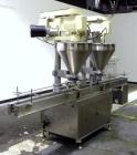 Used Mateer Dual Head Powder Auger Filler. Dual chain conveyor, 3/8
