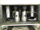 Used Mateer Dual Head Powder Auger Filler. Dual chain conveyor, 3/8