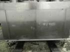 Used Mateer Dual Head Powder Auger Filler. Dual chain conveyor, 3/8