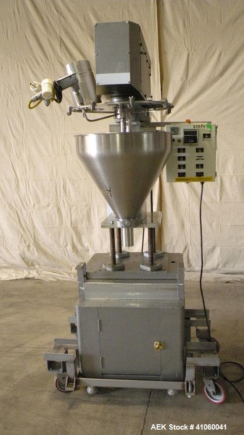 Used All-Fill Single Auger Filler, Model B, stainless steel. Auger model # AF40, 3-1/2" diameter tapered down to 2" at the bottom. Approximately 22" diameter hopper with dust cover. Set up for non-fr...