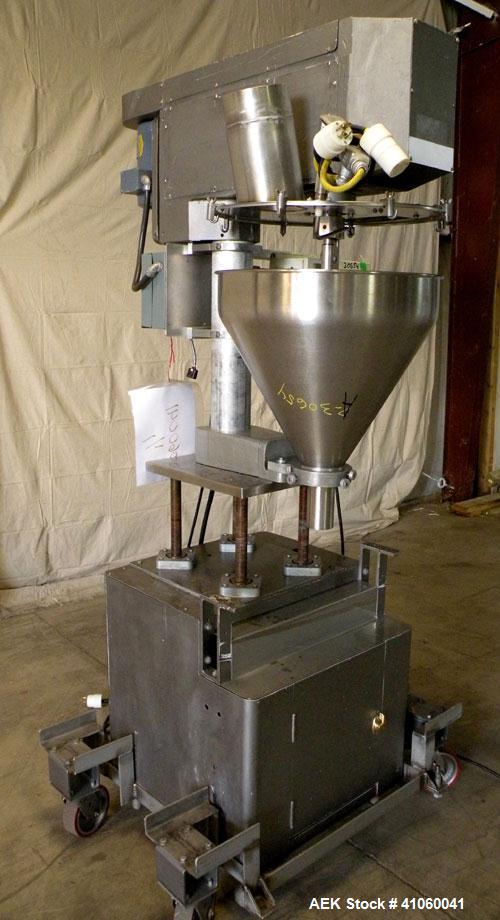 Used All-Fill Single Auger Filler, Model B, stainless steel. Auger model # AF40, 3-1/2" diameter tapered down to 2" at the bottom. Approximately 22" diameter hopper with dust cover. Set up for non-fr...