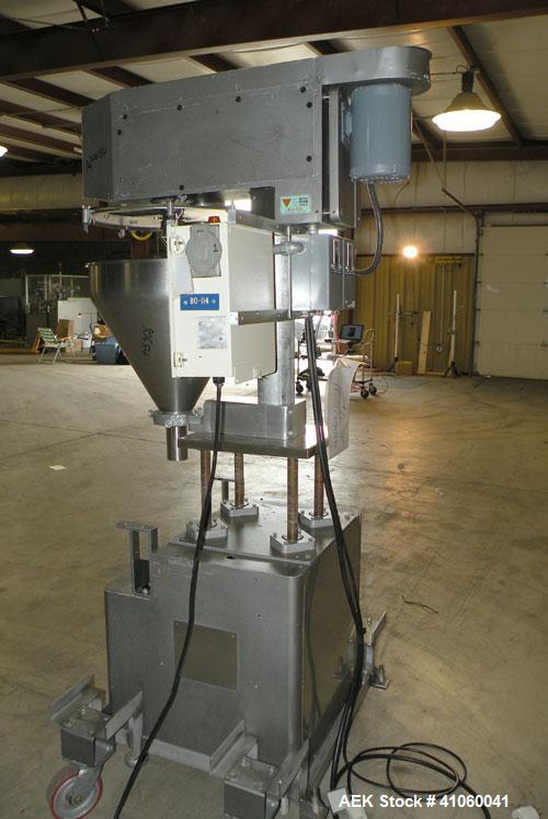 Used All-Fill Single Auger Filler, Model B, stainless steel. Auger model # AF40, 3-1/2" diameter tapered down to 2" at the bottom. Approximately 22" diameter hopper with dust cover. Set up for non-fr...