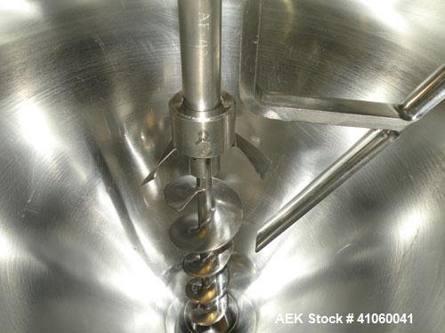 Used All-Fill Single Auger Filler, Model B, stainless steel. Auger model # AF40, 3-1/2" diameter tapered down to 2" at the bottom. Approximately 22" diameter hopper with dust cover. Set up for non-fr...