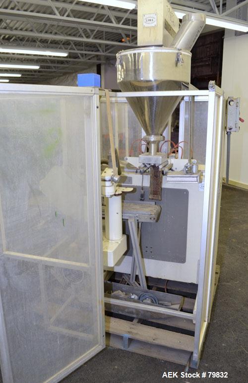 Used Curtis Packaging Machinery Service Model Simpli Fill Powder Auger-Filler. 18" Diameter x 6-1/2" straight side x 14" cone hopper with side scrapers and auger. Driven by .5hp motor, 6" wide x 39" ...