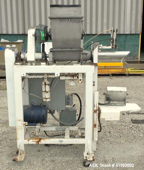 Used Single Auger Bag Packer, stainless steel. 12" x 14" feed hopper with a 12" diameter lump breaker, 2 1/2" diameter bottom screw. Driven by a 3/1.5 hp, 3/60/208-230 volt, 1725/850 rpm motor thru D...