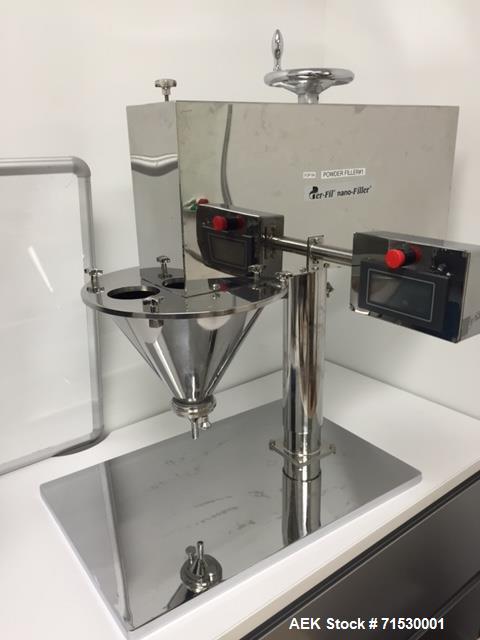Used Per-Fil Nano Filler, Micro Doser Auger Filler, Model NANO-W. Designed for the precision dosing of powders, granules and pastes 25 mg – 50 gram per dose. The Nano-Filler features a precise, servo...