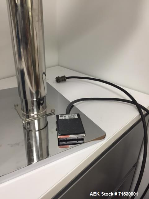 Used Per-Fil Nano Filler, Micro Doser Auger Filler, Model NANO-W. Designed for the precision dosing of powders, granules and pastes 25 mg – 50 gram per dose. The Nano-Filler features a precise, servo...