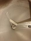 Used AMS Model A100 Semi-Automatic Single Head Auger Filler.