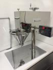 Used Per-Fil Nano Filler, Micro Doser Auger Filler, Model NANO-W. Designed for the precision dosing of powders, granules and pastes 25 mg – 50 gram per dose. The Nano-Filler features a precise, servo...