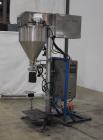 Used- Per-Fil PF Series Servo Auger Filler, Model PF-15S. Foot pedal operation. Control panel with Mitsubishi FX PLC, Baldor...