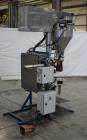 Used- Per-Fil PF Series Servo Auger Filler, Model PF-15S. Foot pedal operation. Control panel with Mitsubishi FX PLC, Baldor...