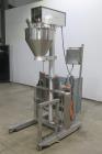 Used Spee-Dee Model 4600 S Semi Automatic Servo Auger Filler. Has stainless Steel agitated hopper. 3/60/240V. This includes a new servo motor from Spee-Dee.