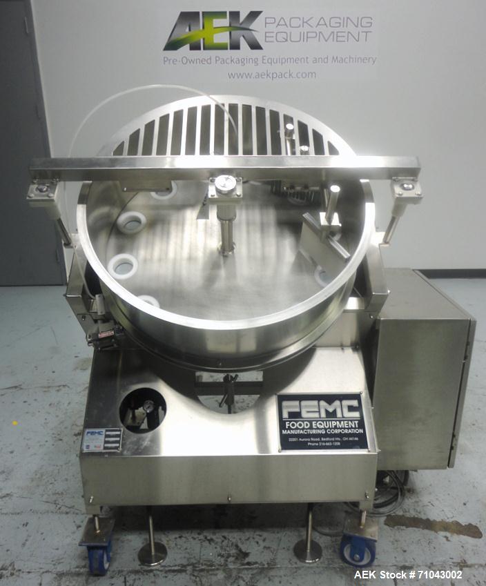 Used FEMC Model 1134 Angular Dial Volumetric Filler. Machine is capable of speeds up to 160 containers per minute. Hopper capacity: 1200 cubic inch. Product dispensing volume up to 50 cubic inch. Des...