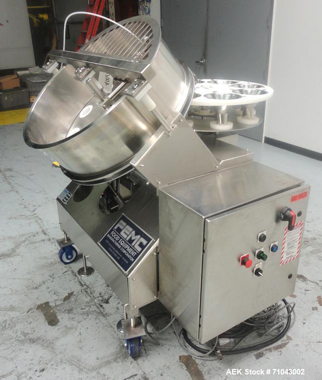 Used FEMC Model 1134 Angular Dial Volumetric Filler. Machine is capable of speeds up to 160 containers per minute. Hopper capacity: 1200 cubic inch. Product dispensing volume up to 50 cubic inch. Des...
