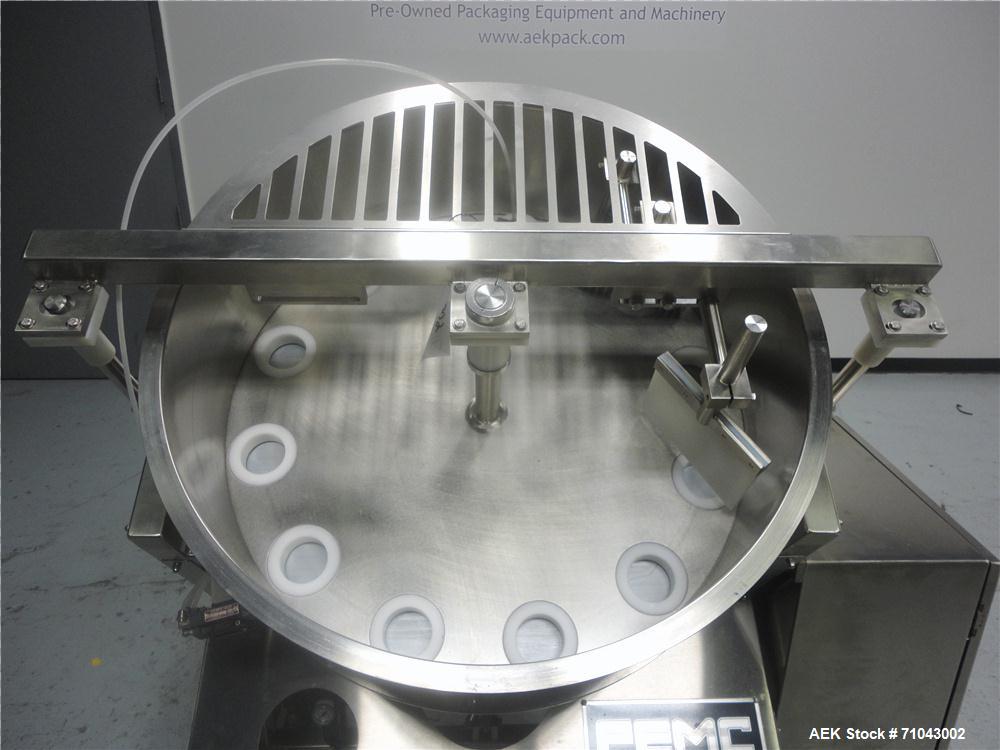 Used FEMC Model 1134 Angular Dial Volumetric Filler. Machine is capable of speeds up to 160 containers per minute. Hopper capacity: 1200 cubic inch. Product dispensing volume up to 50 cubic inch. Des...