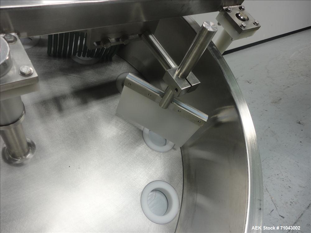 Used FEMC Model 1134 Angular Dial Volumetric Filler. Machine is capable of speeds up to 160 containers per minute. Hopper capacity: 1200 cubic inch. Product dispensing volume up to 50 cubic inch. Des...