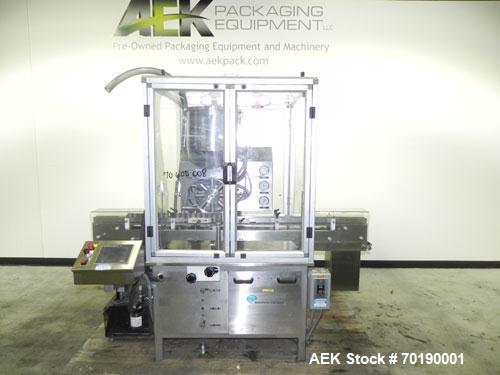Used M&O Perry Model E1200 Vacuum Powder Filler. Capable of speeds up to 150 vial containers per minute. Container size range: (Diam) .75" to 2.06" (Height) 1" to 5.75". Includes Allen Bradley PLC co...