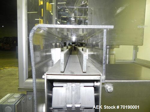 Used M&O Perry Model E1200 Vacuum Powder Filler. Capable of speeds up to 150 vial containers per minute. Container size range: (Diam) .75" to 2.06" (Height) 1" to 5.75". Includes Allen Bradley PLC co...